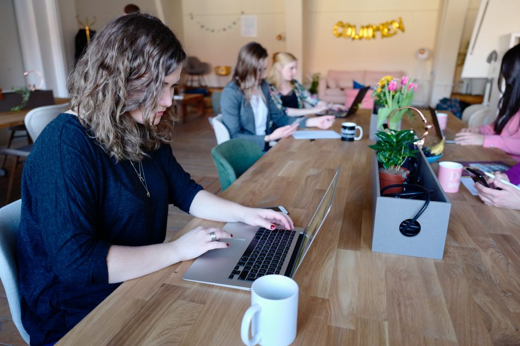 woman-using-laptop-photography-2041398